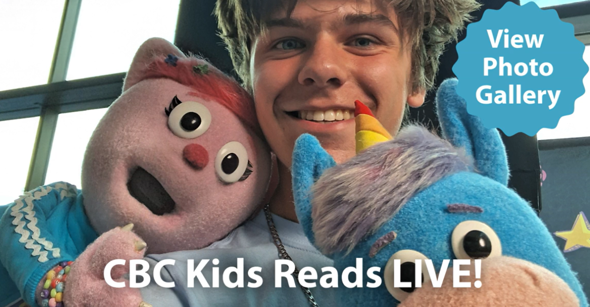 Teen boy with two puppets