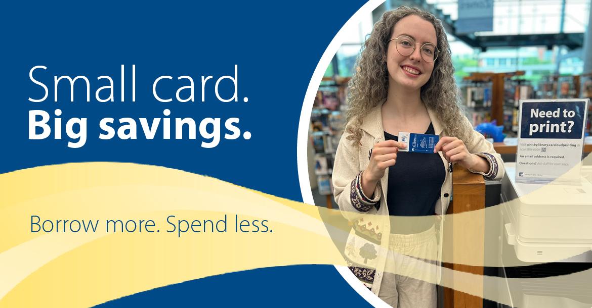 Smiling staff member holding a library card